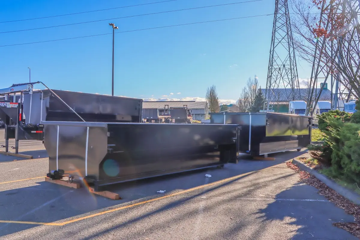 Roll-off dumpster ready for waste disposal at job site for 3 Yard Dumpster Rental in Langley Park